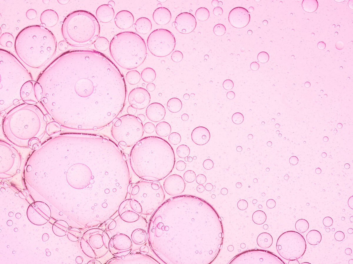 Abstract bubbles on a pink canvas
