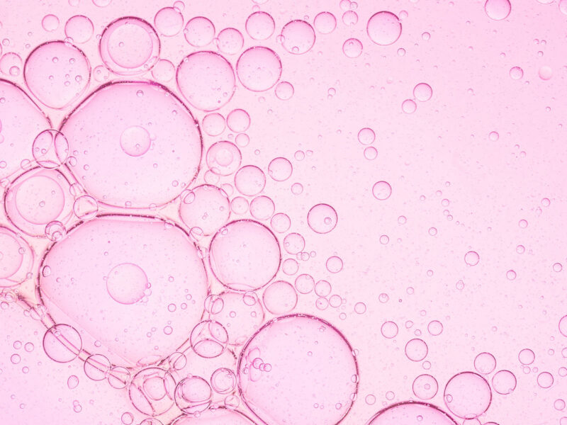 Abstract bubbles on a pink canvas